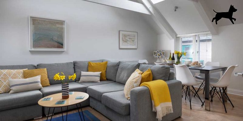 Bay - Living area. Luxury dog friendly accommodation in St Ives, Cornwall. Sleeps 7.