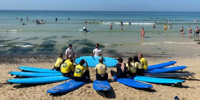 Surfers at St Ives Surf School